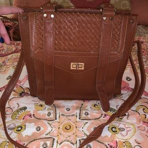 Medium sized brown purse.